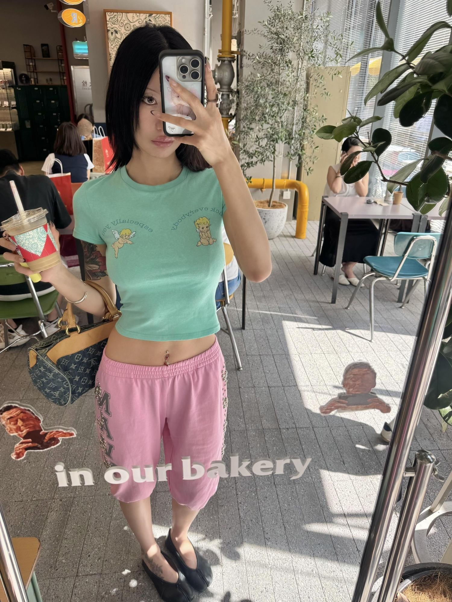 FOURFORTY Mint Green Baby Angel Hand Gesture Graphic Women's Crop Tops
