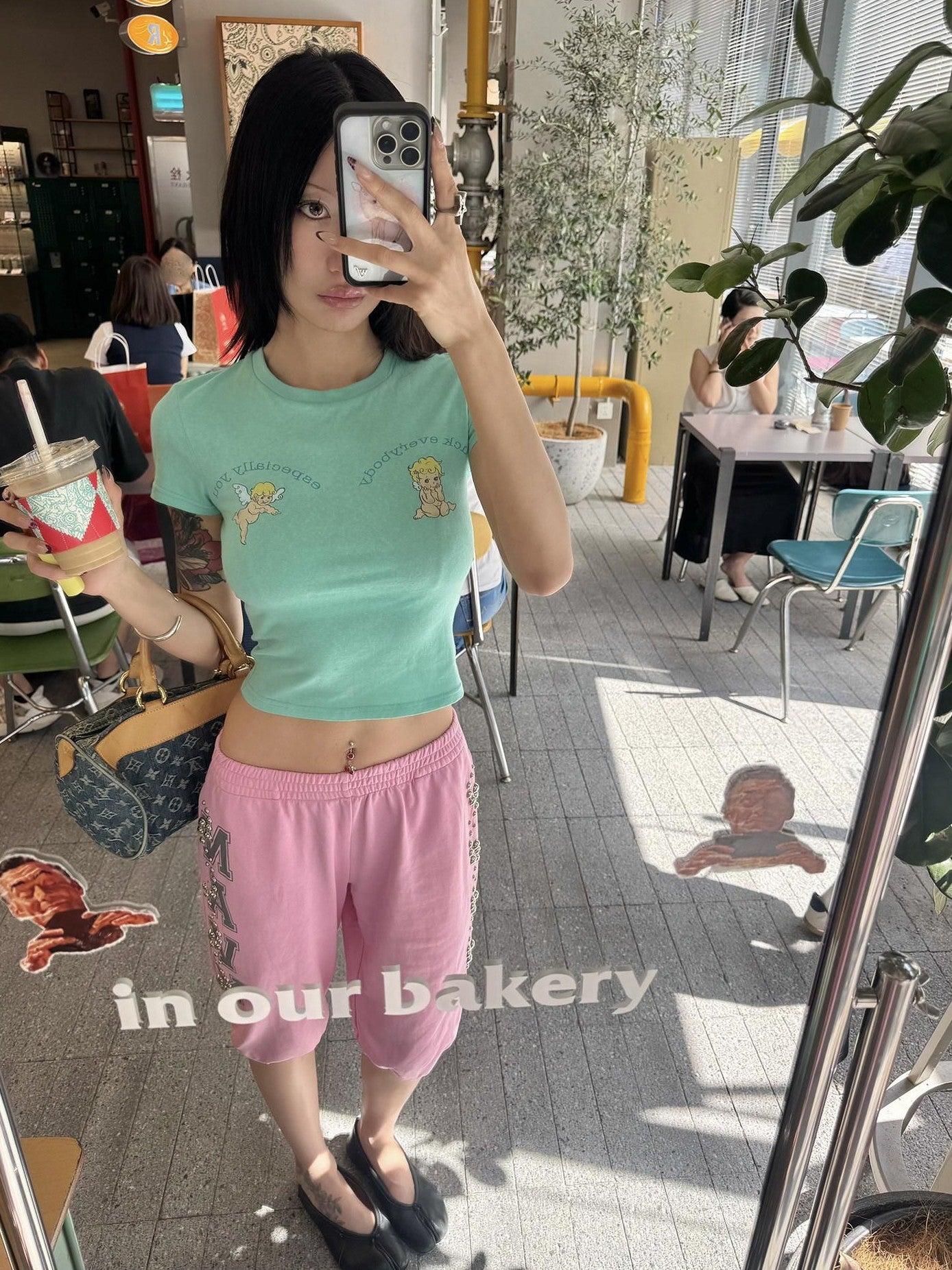 FOURFORTY Mint Green Baby Angel Hand Gesture Graphic Women's Crop Tops