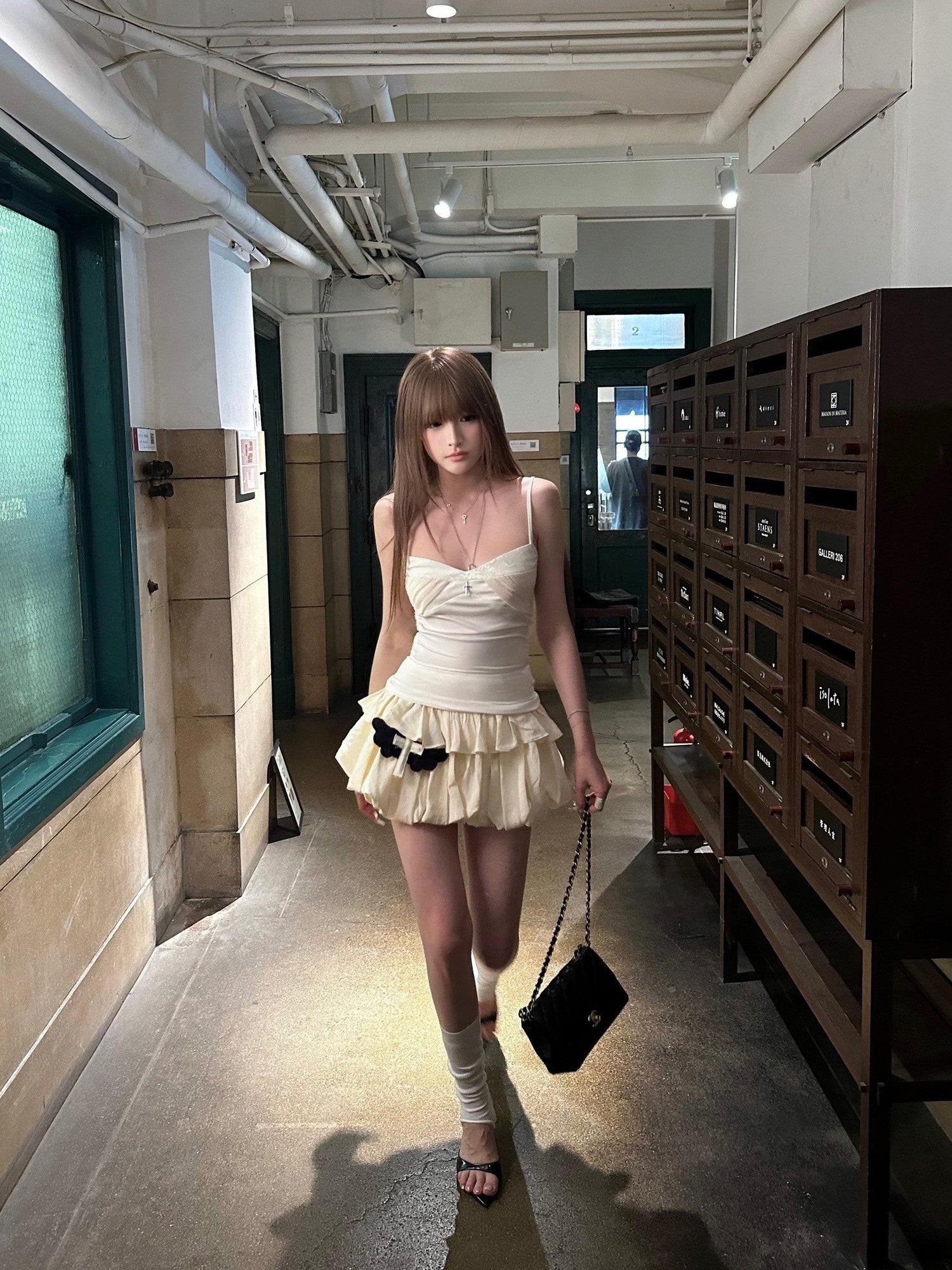 Rase le sol Creamy Bubble Low Waist Puffed Tulip Hem Women's Mini Skirts