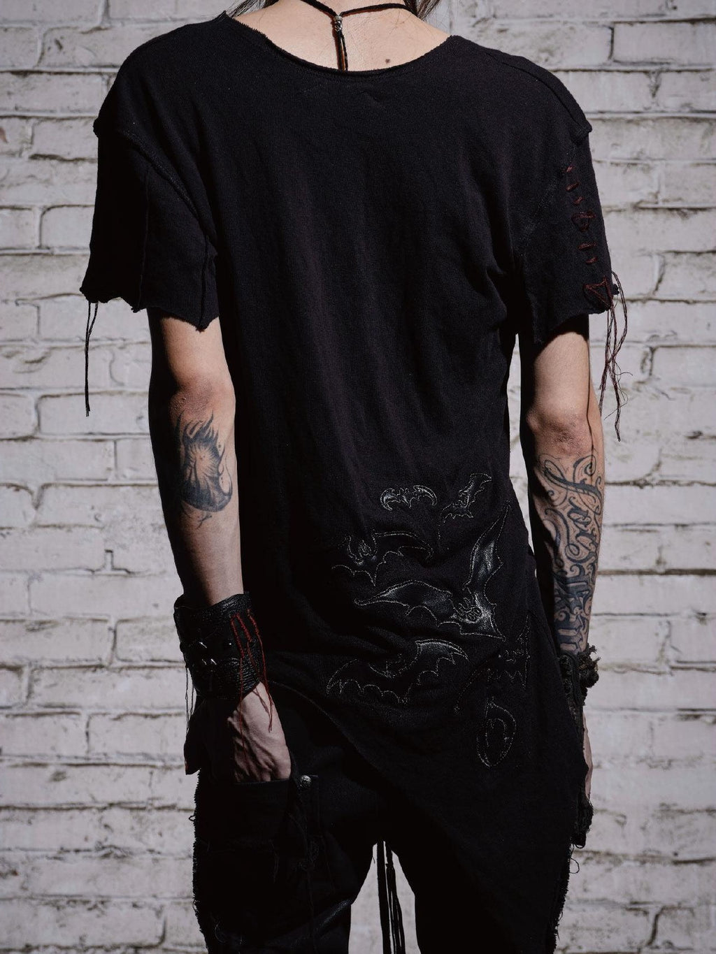 The space between Us Dark Slim Asymmetric Distressed Rock Women's Faux Leather Short Sleeve T-shirts