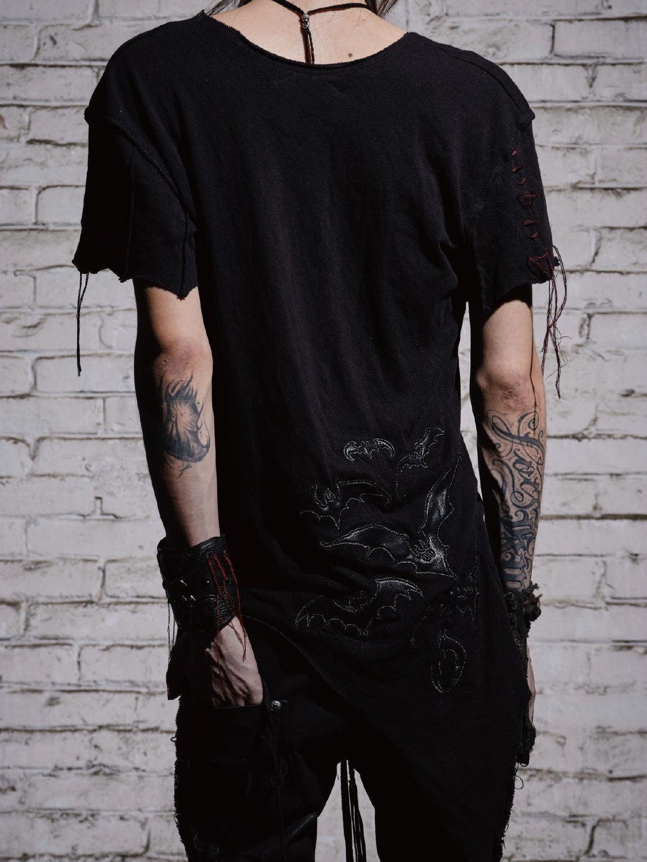 The space between Us Dark Slim Asymmetric Distressed Rock Women's Faux Leather Short Sleeve T-shirts
