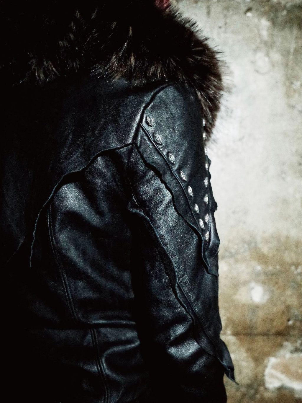 The space between Us Detachable Fur Collar Heavily Riveted Asymmetrical Cut Women's Leather Jackets
