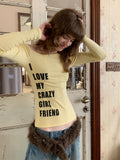 UNIVERSE Yellow Cross Print One Shoulder Women's Lyocell Blend Long Sleeve T-shirts