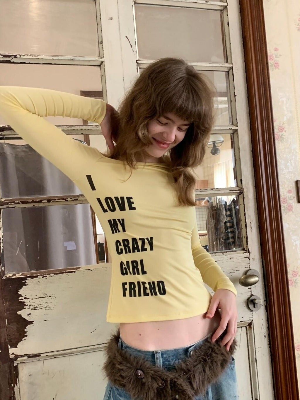 UNIVERSE Yellow Cross Print One Shoulder Women's Lyocell Blend Long Sleeve T-shirts