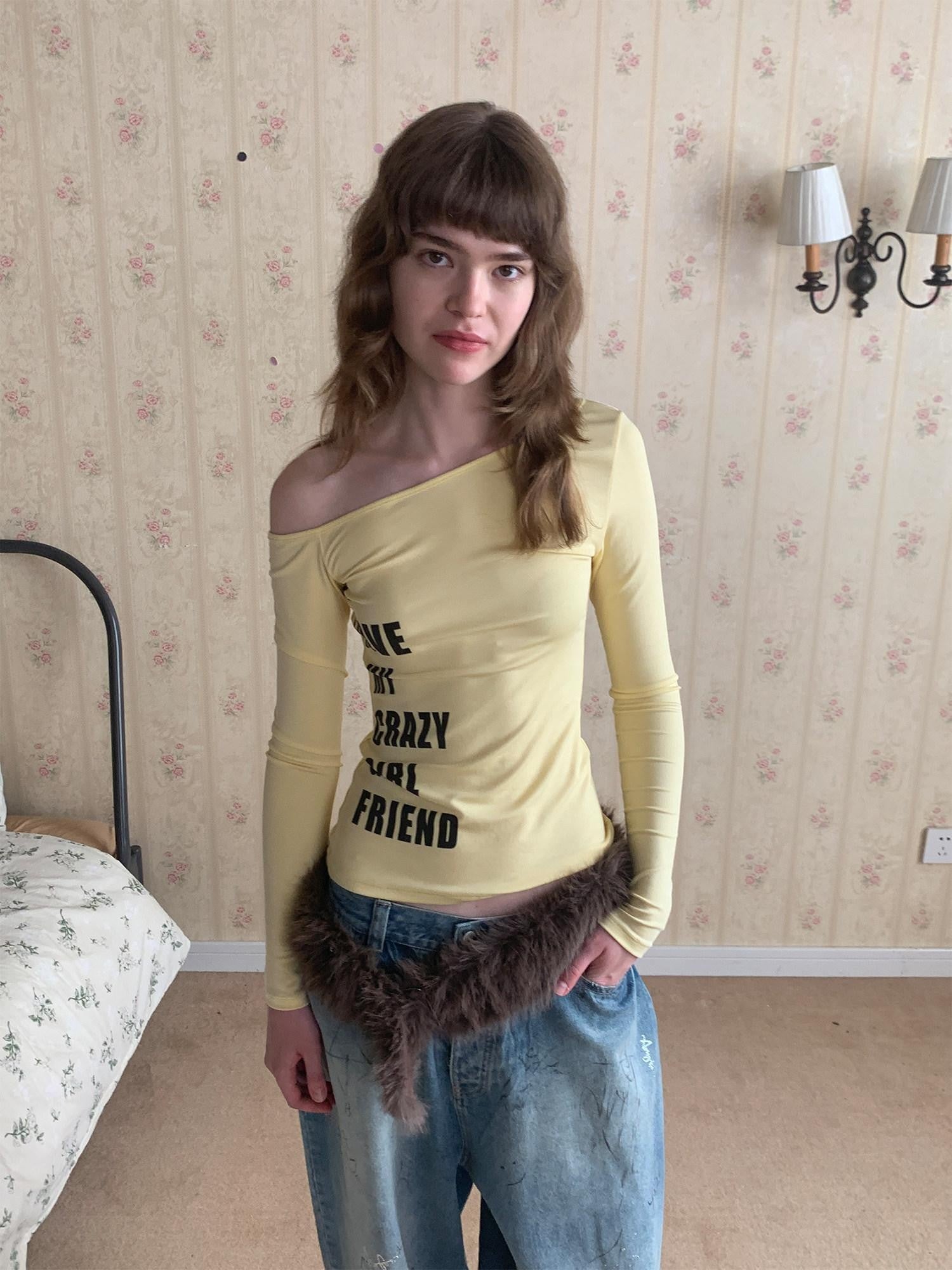 UNIVERSE Yellow Cross Print One Shoulder Women's Lyocell Blend Long Sleeve T-shirts
