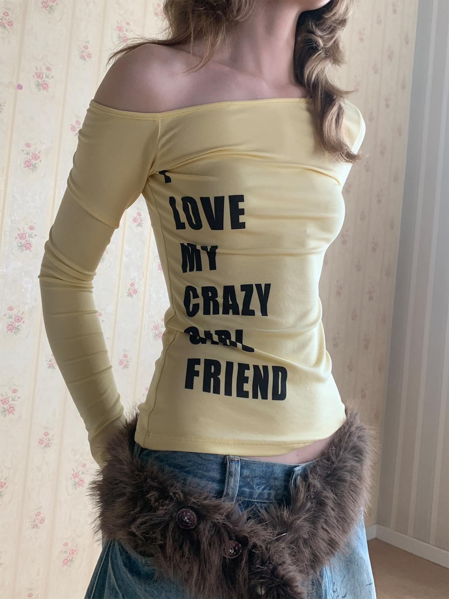 UNIVERSE Yellow Cross Print One Shoulder Women's Lyocell Blend Long Sleeve T-shirts