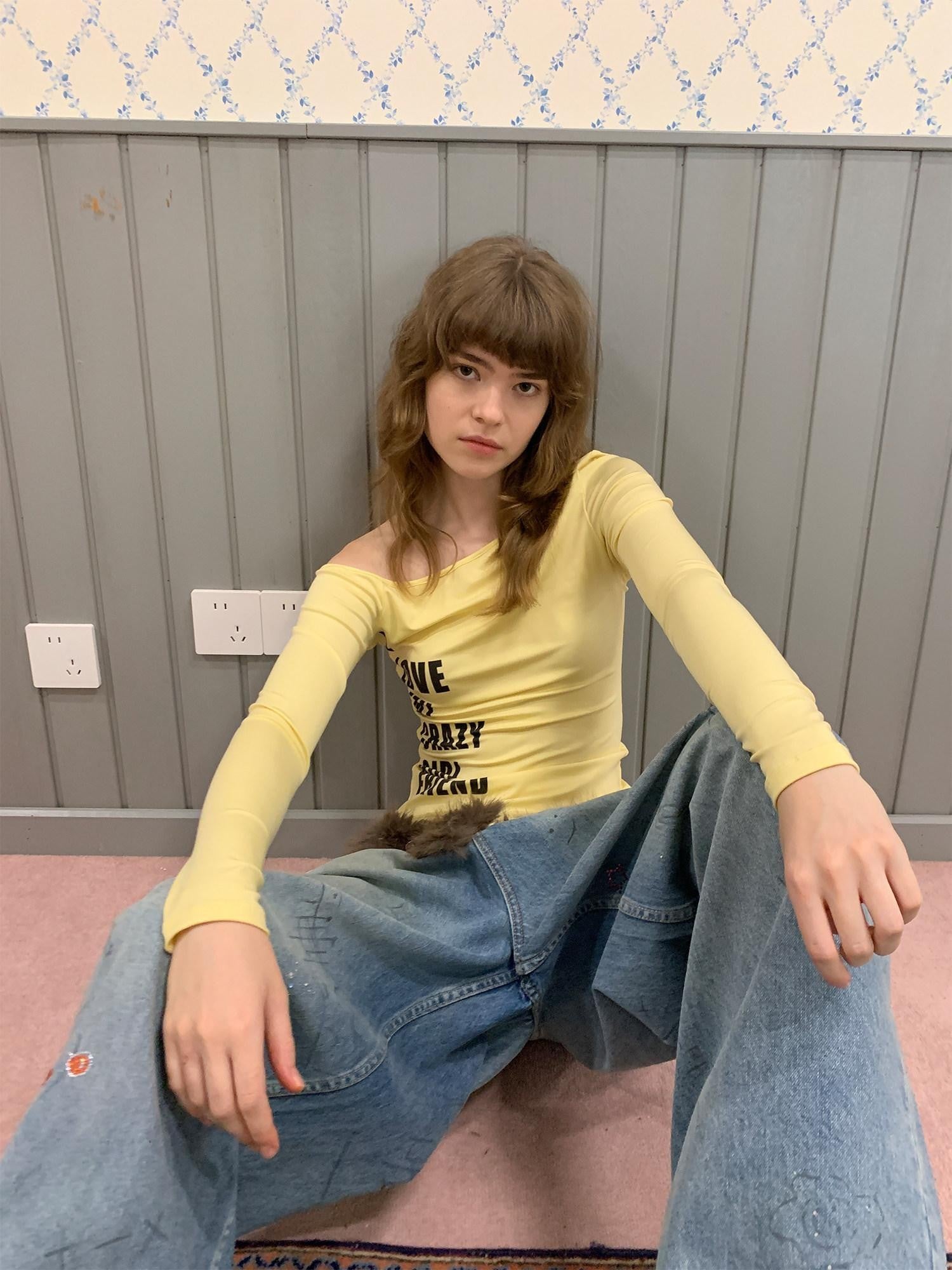 UNIVERSE Yellow Cross Print One Shoulder Women's Lyocell Blend Long Sleeve T-shirts