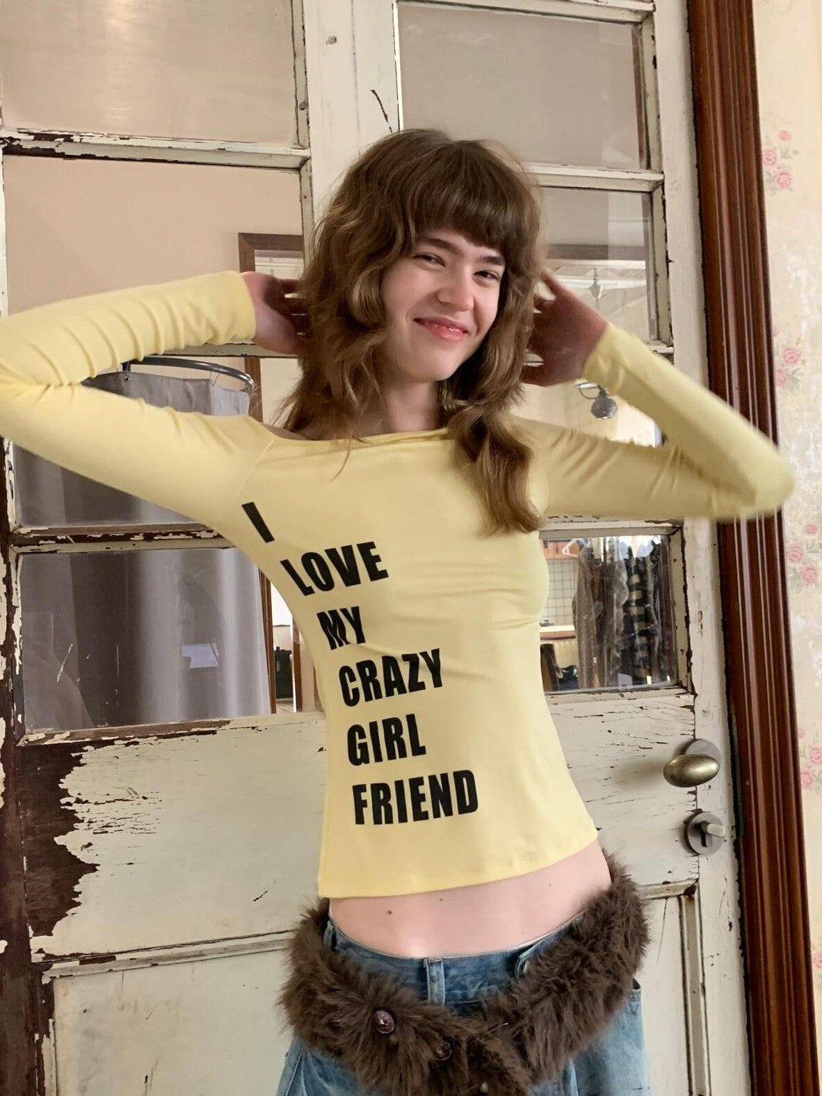 UNIVERSE Yellow Cross Print One Shoulder Women's Lyocell Blend Long Sleeve T-shirts