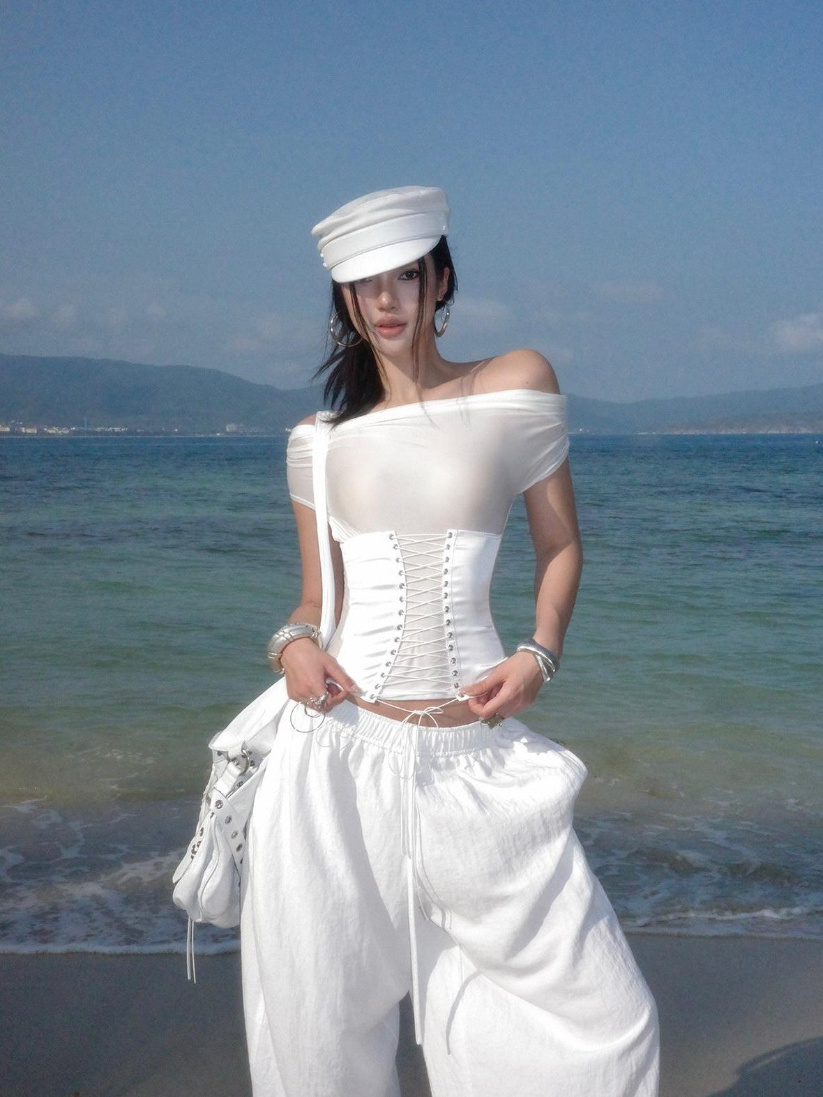 rovente White Asymmetric Shoulder Cutout Tie Waist Women's Nylon Spandex Slim T-shirts